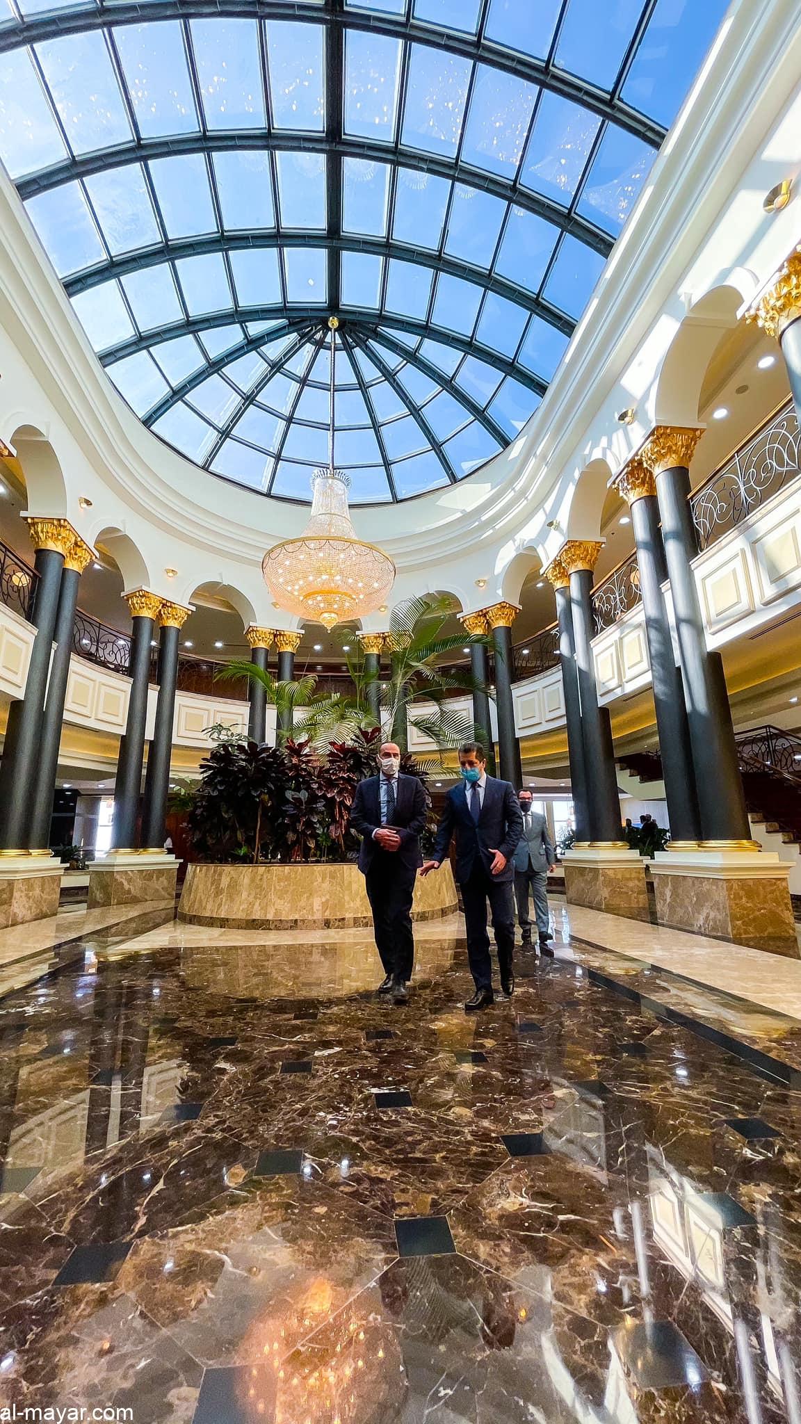 May be an image of chandelier and indoor